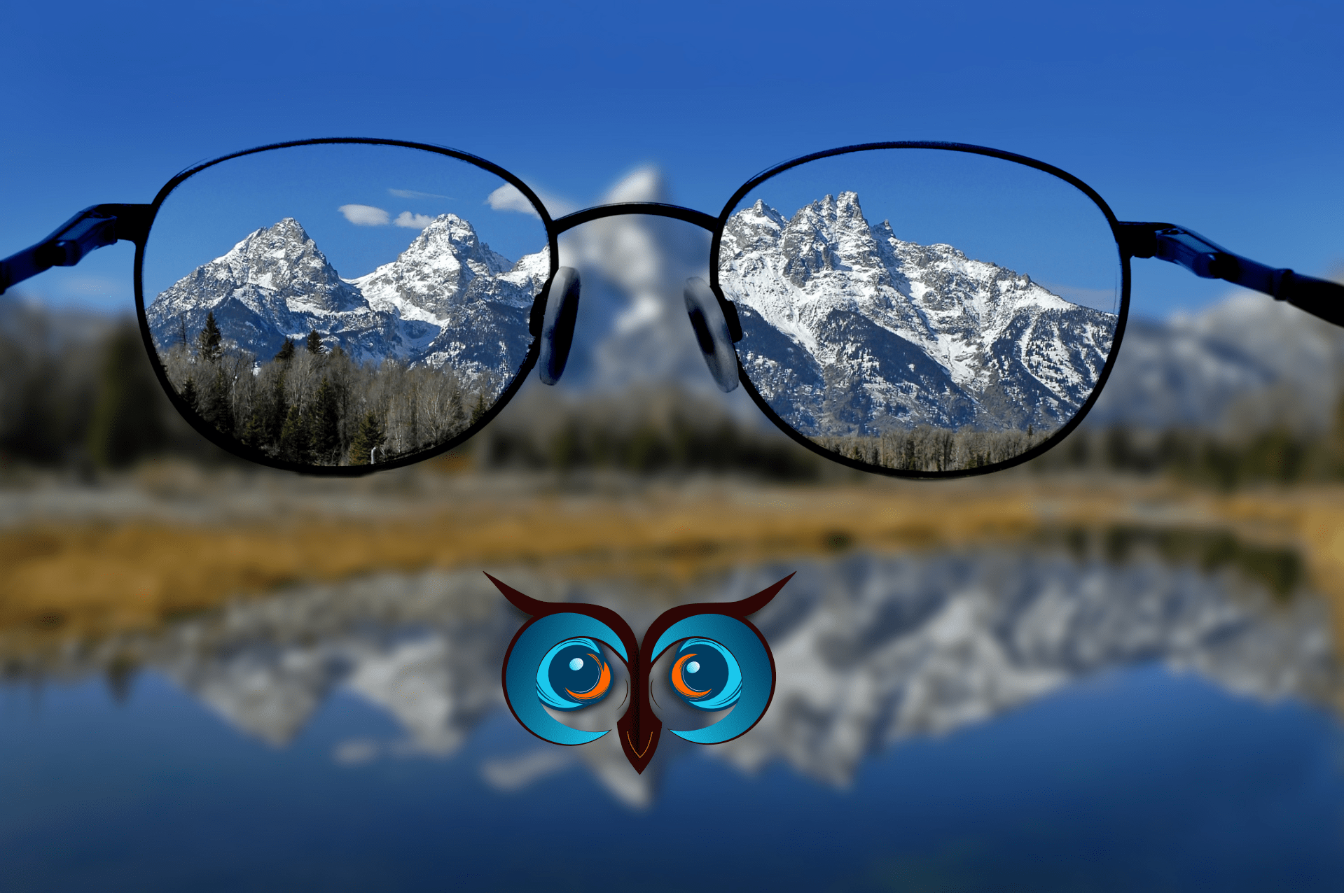 blurry mountains with clear view behind glasses - branding