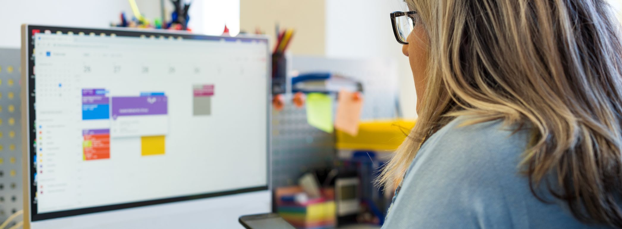 office manager looking at online calendar 